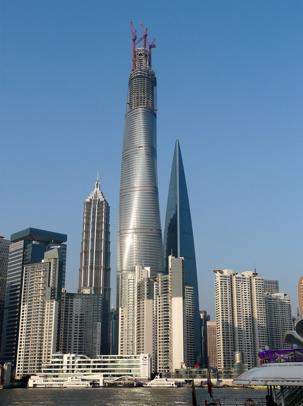 Recent view of Shanghai Tower Shanghai World Financial Center and Jin Mao Tower from across the river 