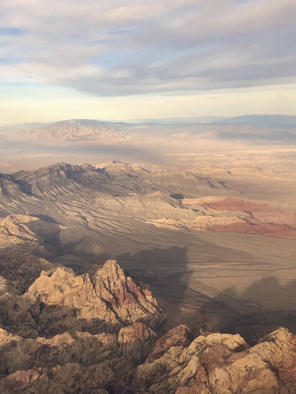 Red rock Las Vegas NV - I like the way the mountains cast shadows across the desert floor OC 