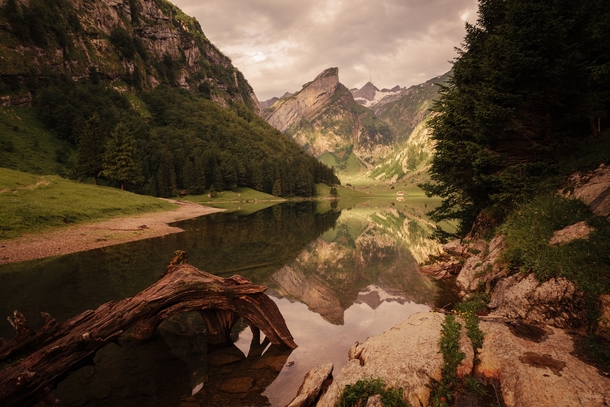Reflective lake in the Swiss Alps by Rebekka Plies 