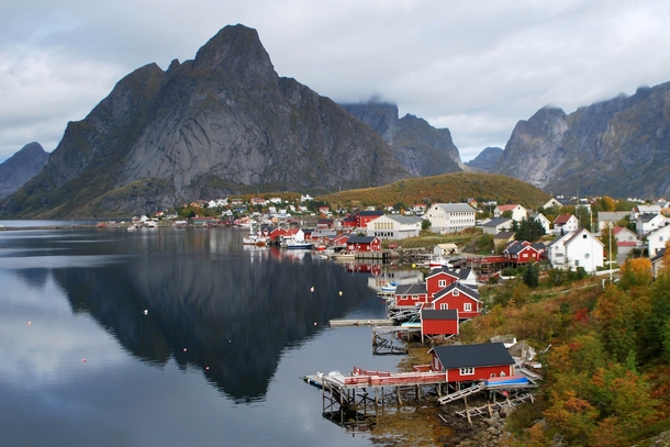 Reine - a small fishing village nestled between the sea and lofty mountains in the Lofoten Islands photographed by Jennifer Batryn 