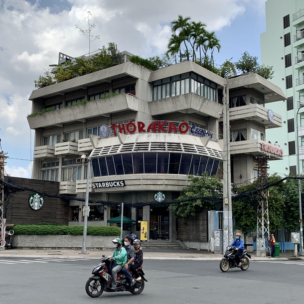 Retro futuristic concrete jungle Starbucks in Ho Chi Minh City Vietnam