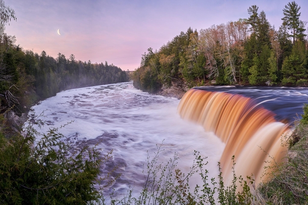 Rewarded with a beautiful sunrise and moonrise at Tahquamenon Falls in the UP of Michigan after driving  hours in the middle of the night from Detroit 