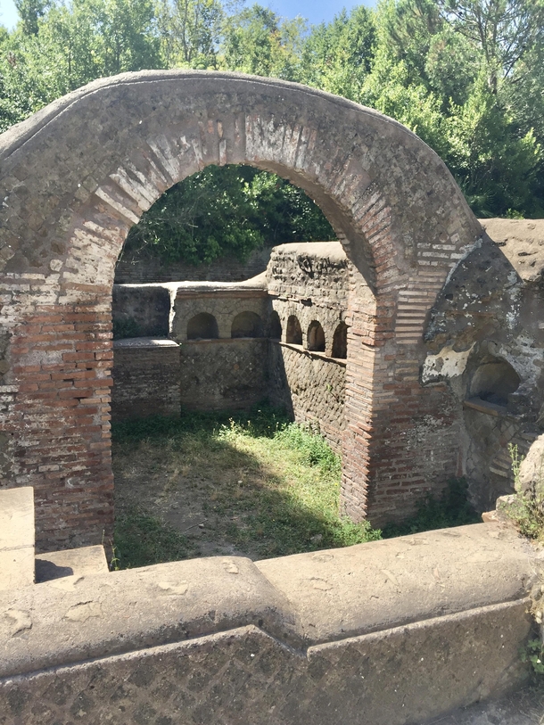 Roman columbarium on the Via Ostiensis a two-story family tomb with niches for crematory urns It contains a staircase leading to a terrace which was used for funerary banquets The courtyard features an ustrinum the area where the deceased were burned cst 