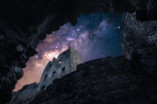 Ruins of an old castle under the Milky Way