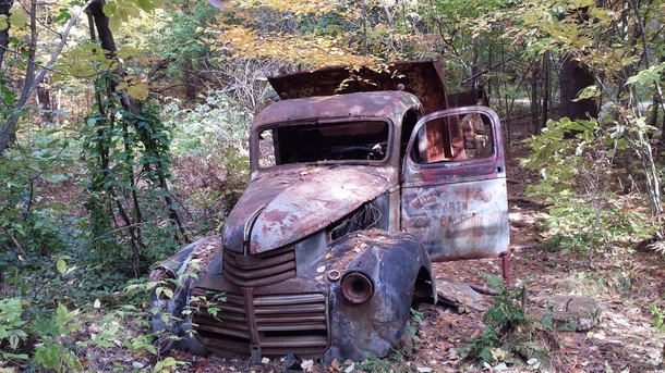 Rusted-out truck in the woods of Maine 