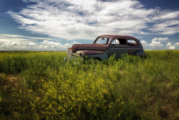 Rusting in the Badlands of South Dakota  by Ray Reiffenberger