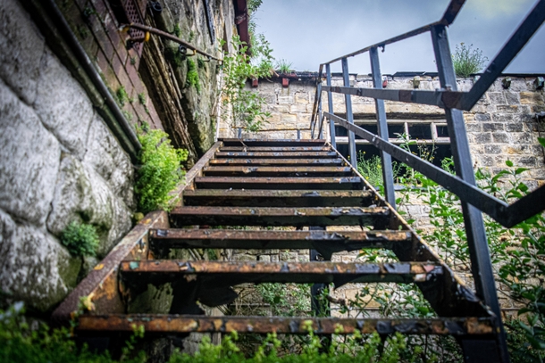 Rusty stairs leading to a class room