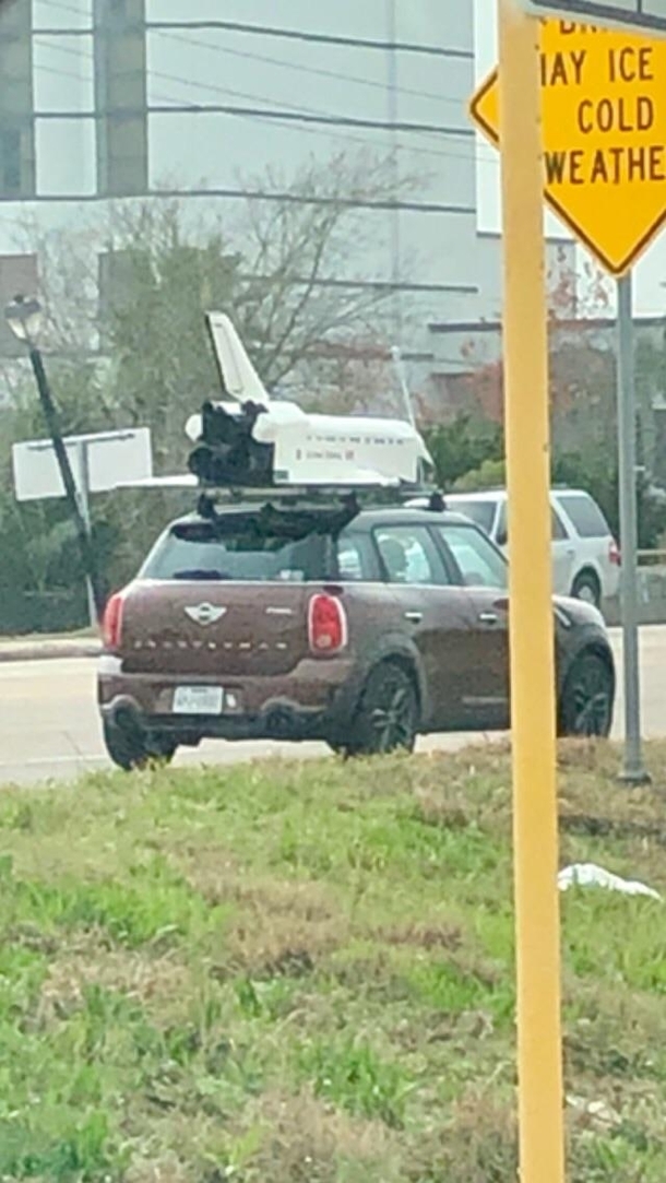 Saw this today near NASA in Houston The space shuttle on top of a Mini Cooper