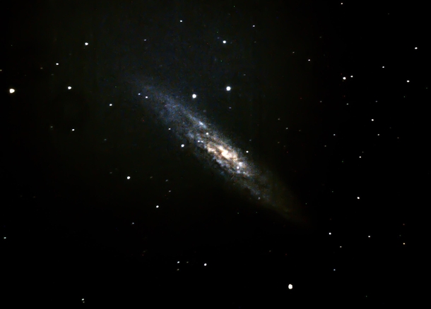 Sculptor Galaxy shot from my backyard New Zealand in the worst possible condition This is my first deep sky object from my backyard in the city No filtersFancy light pollution gear Super stoked