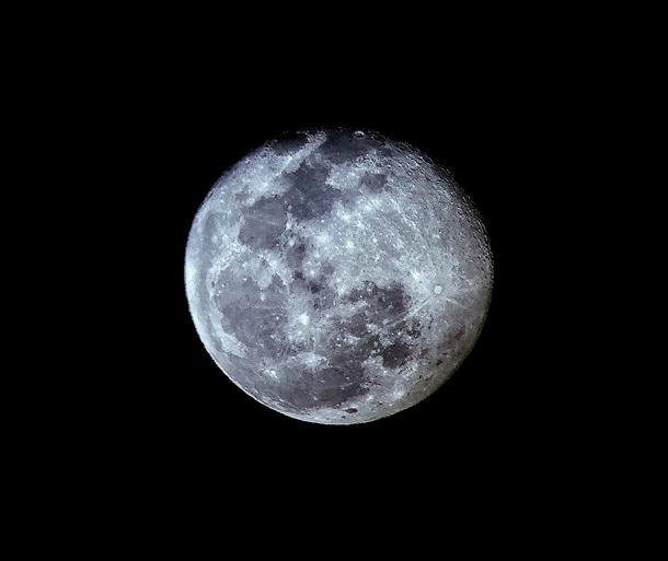Second attempt of a Moon photo Taken on an S through a Celestron Powerseeker EQ Telescope Structure sharpness contrast brightness white balance and highlights edited with Snapseed