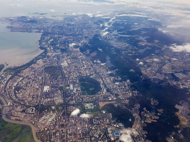 Shenzhen China from an airplane sorry for potato quality taken from cell phone   x 