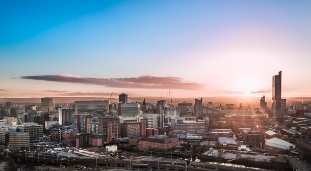 Skyline of Manchester England at dawn facing east 