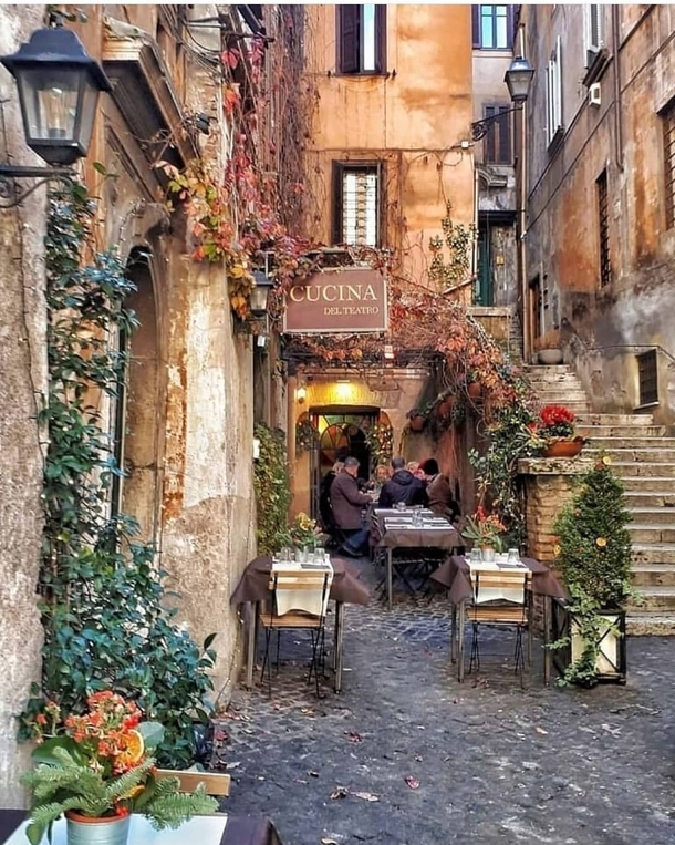 Small restaurant at a street corner in Rome Italy