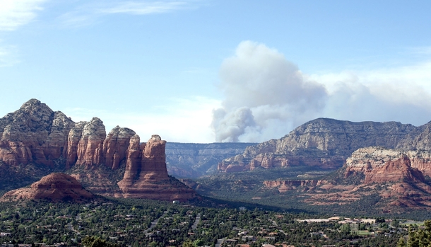 Smoke rises from the Slide Fire as it burns up Oak Creek Canyon in Sedona Arizona on May   The fire has burned approximately  acres  Photo by Ross D Franklin