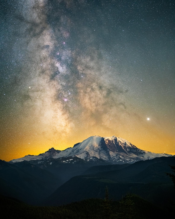 Snow-capped mountains and starry skies make quite the pair - Mt Rainier  OC jackfusco