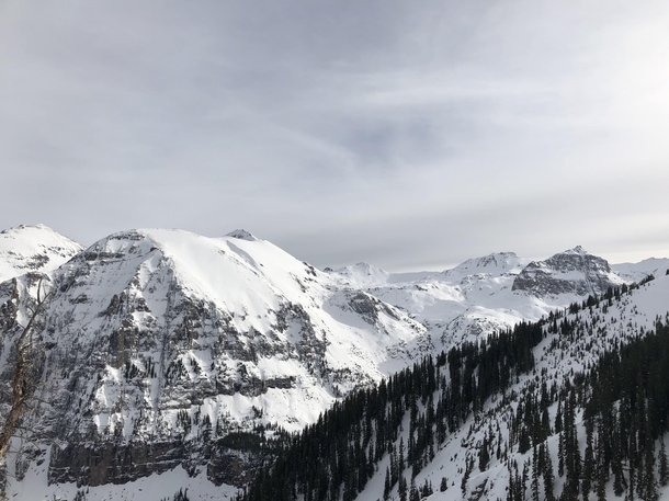 Snow crested peaks and cliffs at the top of Telluride CO 