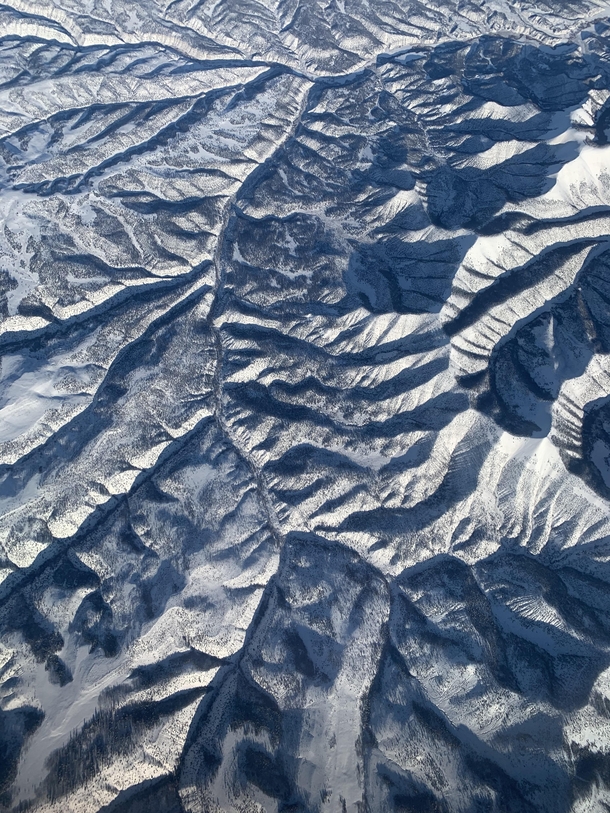 Snowy hills from above Salt Lake City Utah 