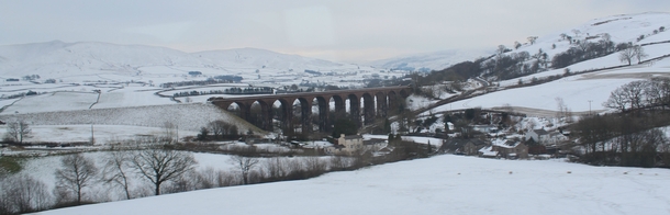 Snowy viaduct Cumbria England Taken from a train 