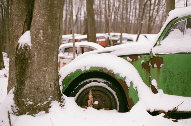 Snowy Volkswagen Beetle graveyard shot on film 