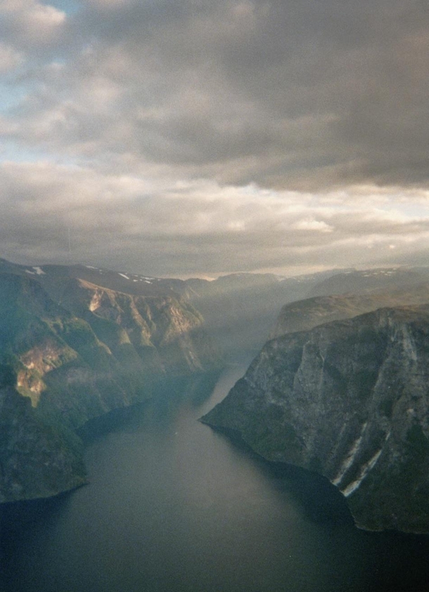 Some god rays hitting up Nryfjorden viewpoint Kalvsnesnosi -  masl Sogn og Fjordane Norway in July  - Analog film  x