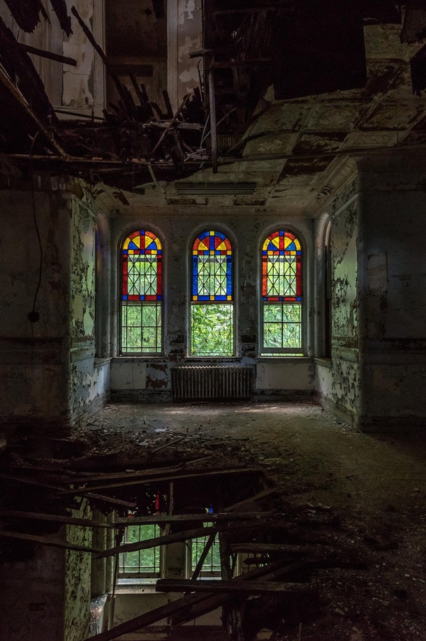 Something smashed through both the ceiling and floor of this abandoned asylum in New York 