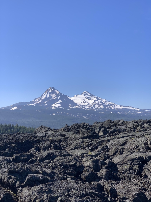 South and Middle Sisters mountains in Eastern Oregon Picture taken from lava field 
