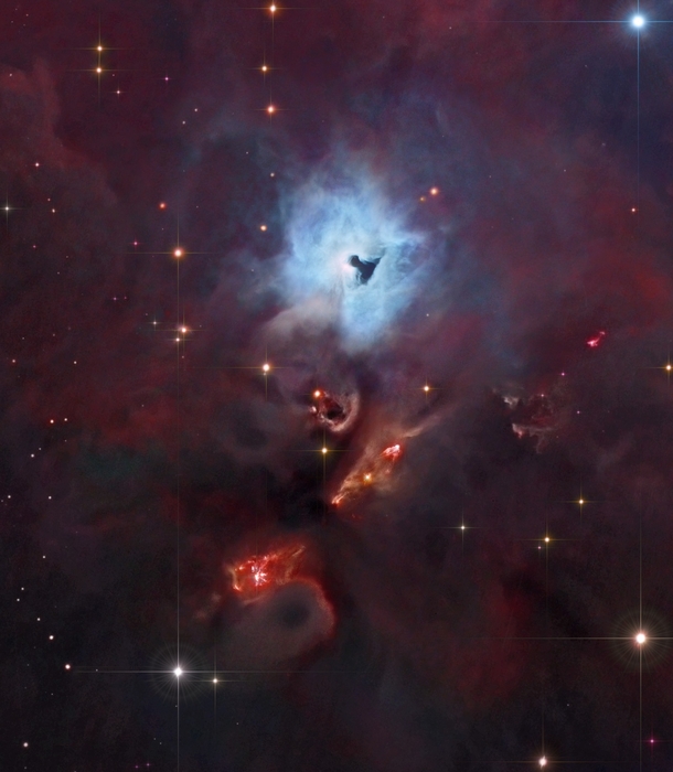 South of the large star-forming region known as the Orion Nebula lies bright blue reflection nebula NGC  At the edge of the Orion molecular cloud complex some  light-years distant NGC s illumination is provided by the embedded variable star V Orionis 