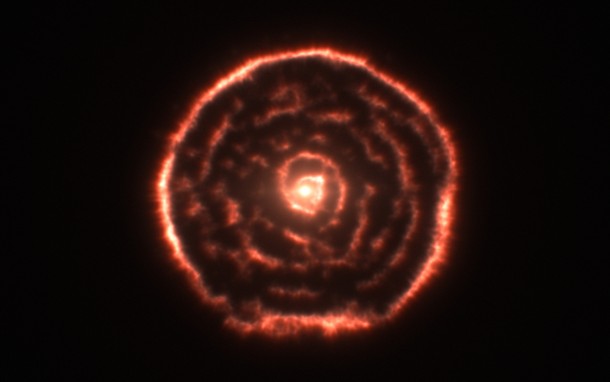 Spiral Nebula Surrounding Star R Sculptoris a red giant star located about  light years away toward the constellation of the Sculptor Sculptoris 