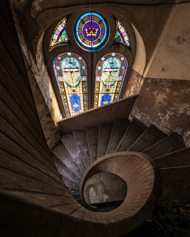 Spiral Staircase inside an abandoned cathedral 