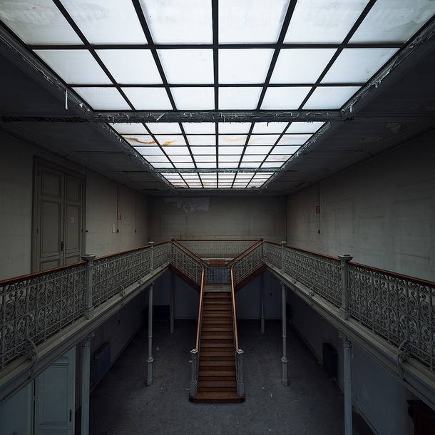 Split staircase and skylight in an abandoned university in Belgium 