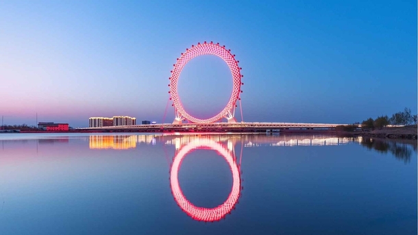 Spokeless Ferris Wheel on a Bridge in China 