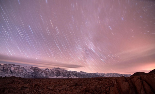 Star trails over the mountains Eastern Sierra Nevadas California 