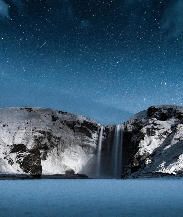 Starry night over Skgafoss Iceland 