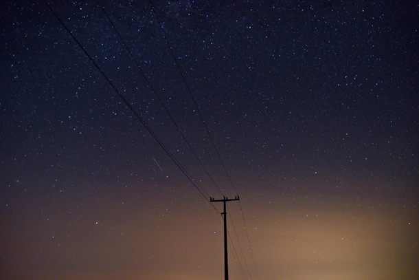 Stars behind a power line
