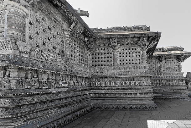 Stone carved walls of an old Vishnu temple in India 