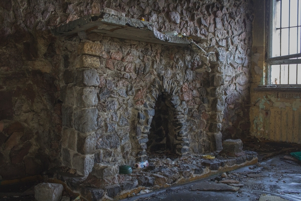 Stone fireplace in an abandoned prison 