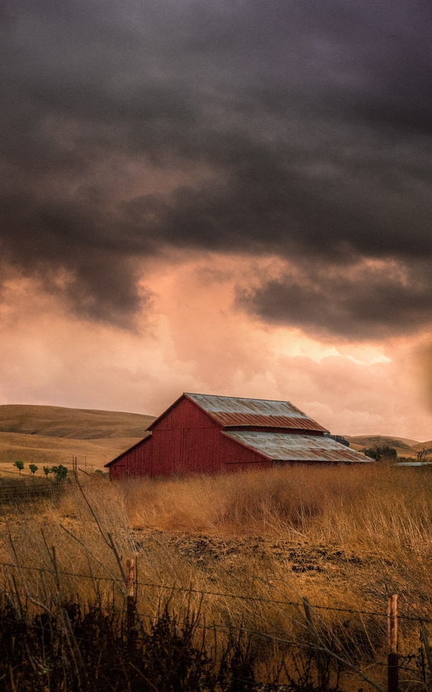 Stormy Skies over Red Barn in Livermore California 
