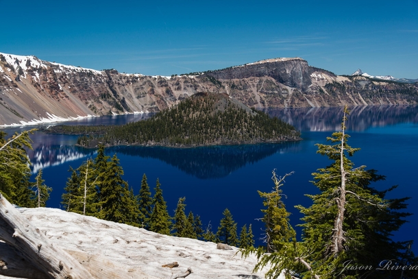 Summertime at Crater Lake on a rare sunny day in Oregon USA  by Jason Rivera