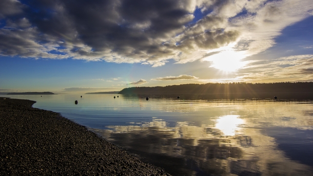 Sun rays and calm waters from the shores of Tulalip WA 