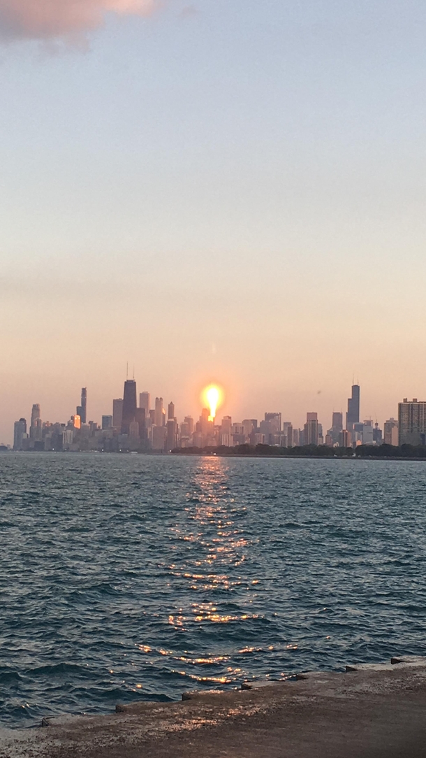 Sun reflecting on glass tower in Chicago 