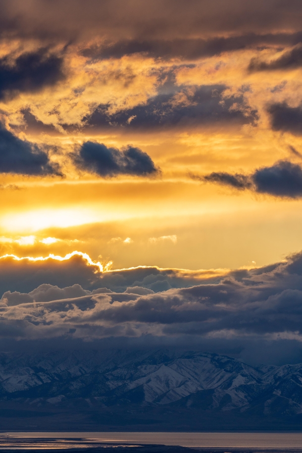 Sun setting through a snow storm in northern Utah