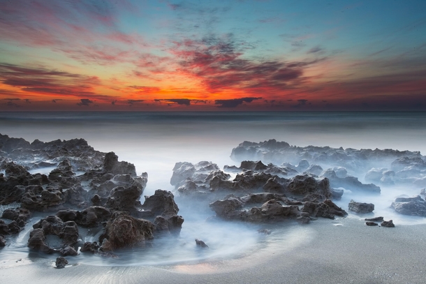 Sunrise at Coral Cove Fl  By Andres Leon