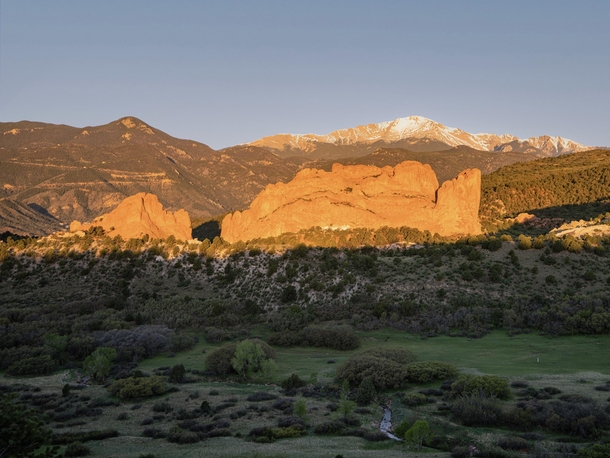 Sunrise casting morning light over Pikes Peak and Garden of the Gods Colorado Springs CO xOC