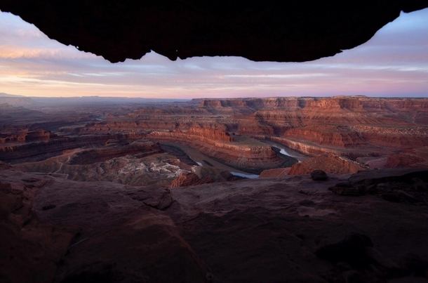 Sunrise from a cave at Dead Horse Point UT 