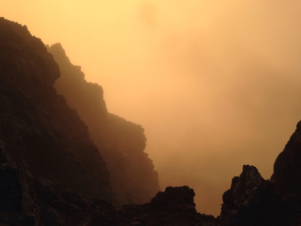 Sunrise from inside a cloud while mountaineering in Oregon 