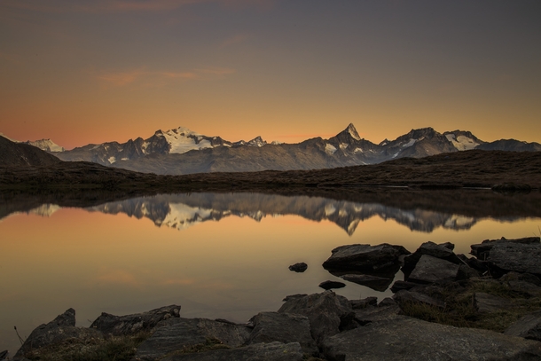 Sunrise over a mountain lake in Goms Switzerland  Photographed by Imhof Patrick