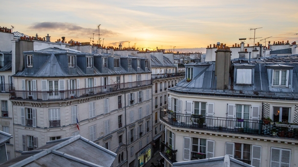 Sunrise over rooftops in Pigalle Paris 
