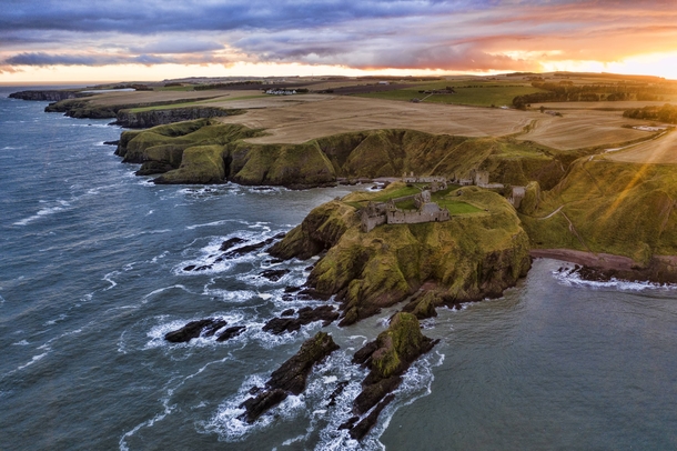 Sunset at the ruins of Dunnottar Castle Scotland which was abandoned around  years ago 
