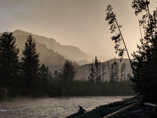 Sunset in the rain along the Madison River in Yellowstone National Park One of my favorite places on Earth 