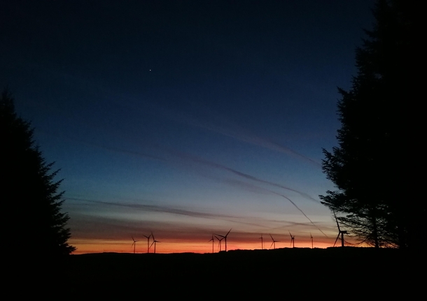 Sunset over the windfarm South Wales